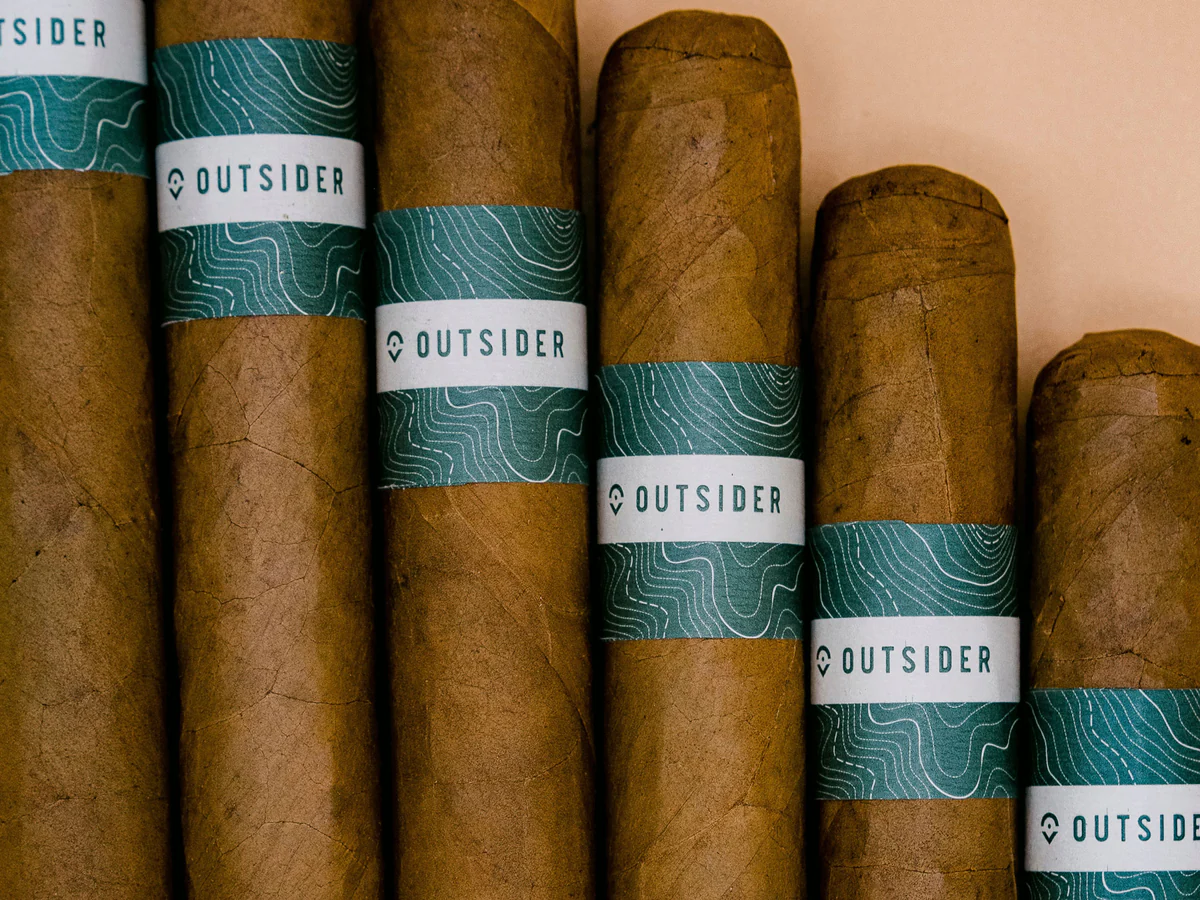 Our Story - cigars-outsider
